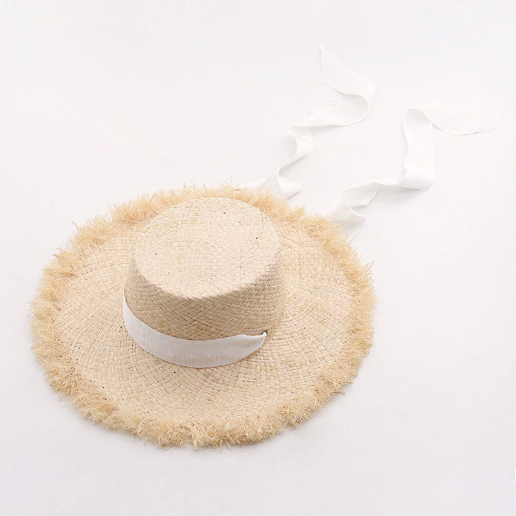 Flat Top Fringed Raffia Hat with White Ribbon Tie